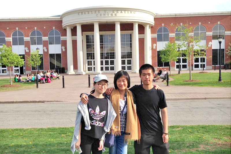 AITEC family went to cheer for Tony for his Provincial Jr. Swimming competition at St. FX University in Antigonish. Summer, Ming-Ling (Director), and Jerry. (left to right)